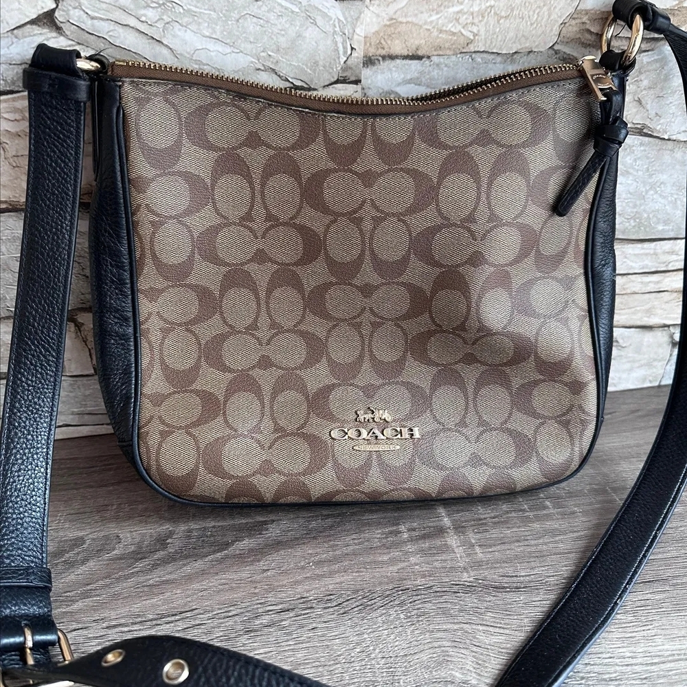 Coach Brown and Black Crossbody Bag with Signature Design